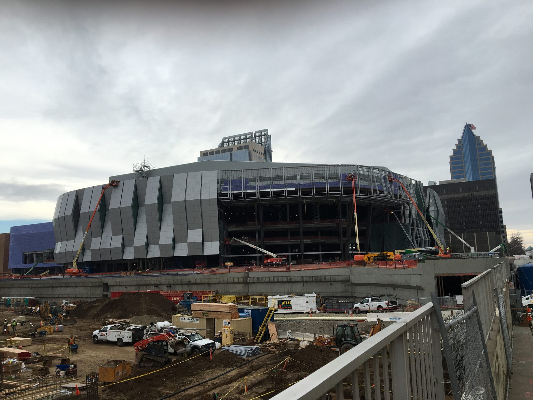 Arena under construction with structural steel and facade panels
