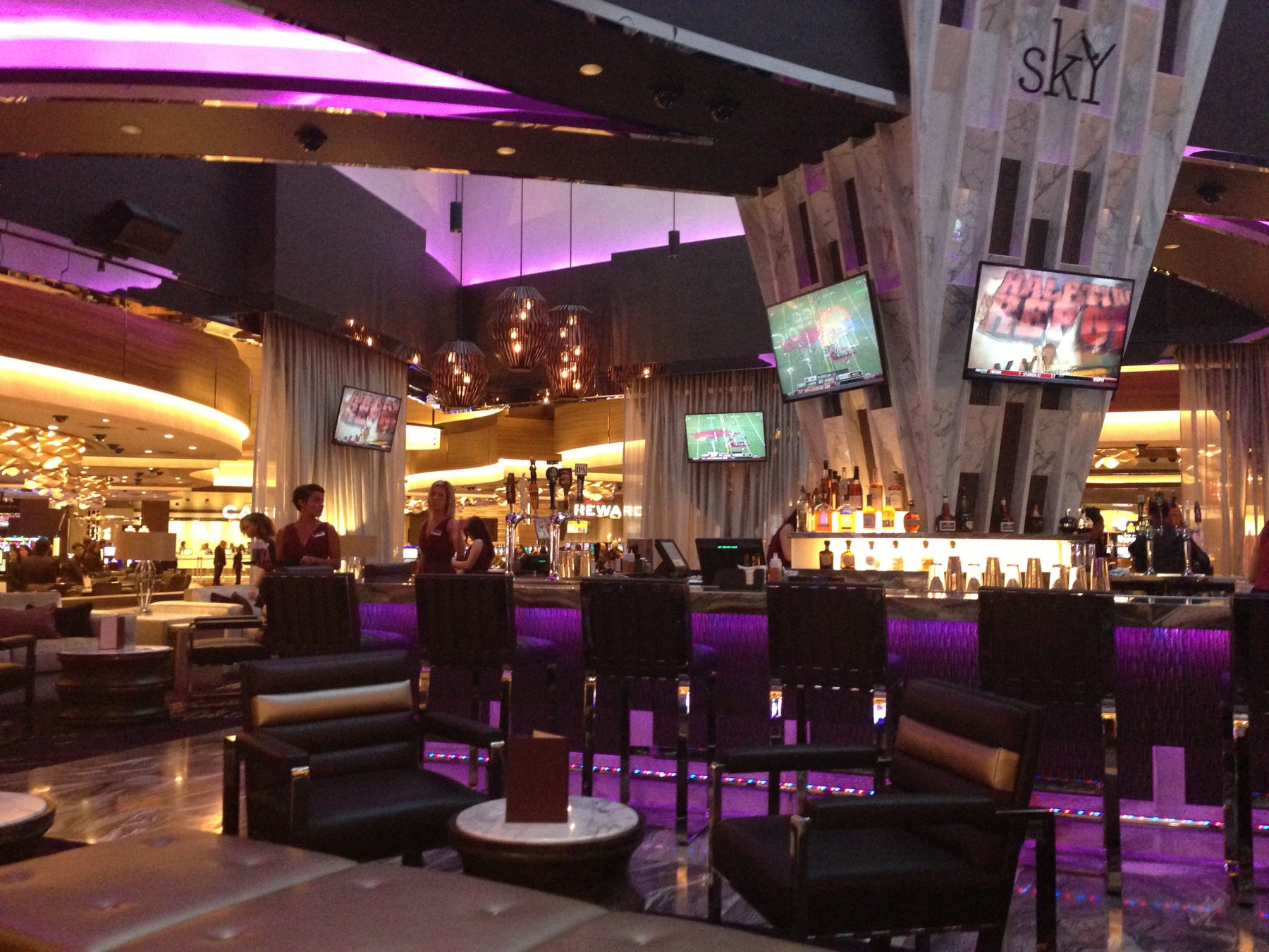 Hospitality lounge with distributed audio and video displays